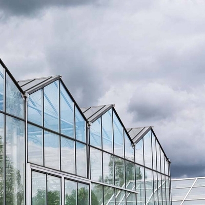 Automatic Control Intelligent Agricultural Glass Greenhouse For Sale Farm Cooling Shading Irrigation System