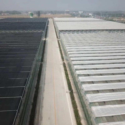 Automatic Control Intelligent Agricultural Glass Greenhouse For Sale Farm Cooling Shading Irrigation System
